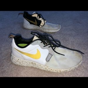 Nike one of a kind black white and gold sneaker